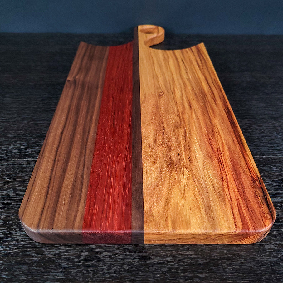 Canary, Padauk, and Walnut Charcuterie Board